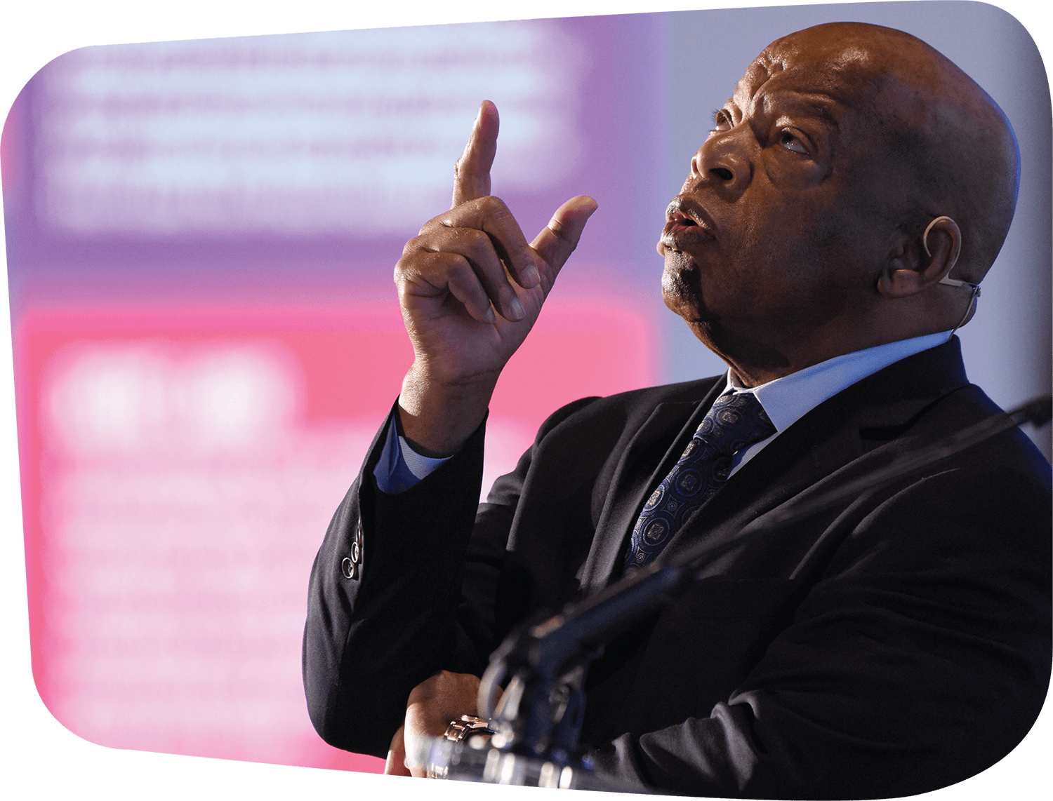 Man speaking and pointing at sky
